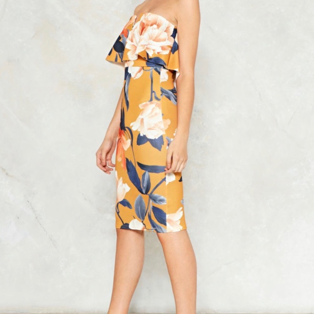 Midi form fitting floral dress with stretch.